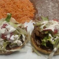  Sopes (2) . · Thick corn tortilla with refried beans with your choice of meat (asada, carnitas, chorizo, c...