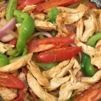 Fajitas. · Strips of beef or chicken sautéed with bell peppers and red onion. Served with rice, beans ,...