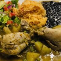 Pollo En Salsa/Chicken On Sauce . · Chicken in green sauce with potatoes and peas, served with rice, beans and tortillas.