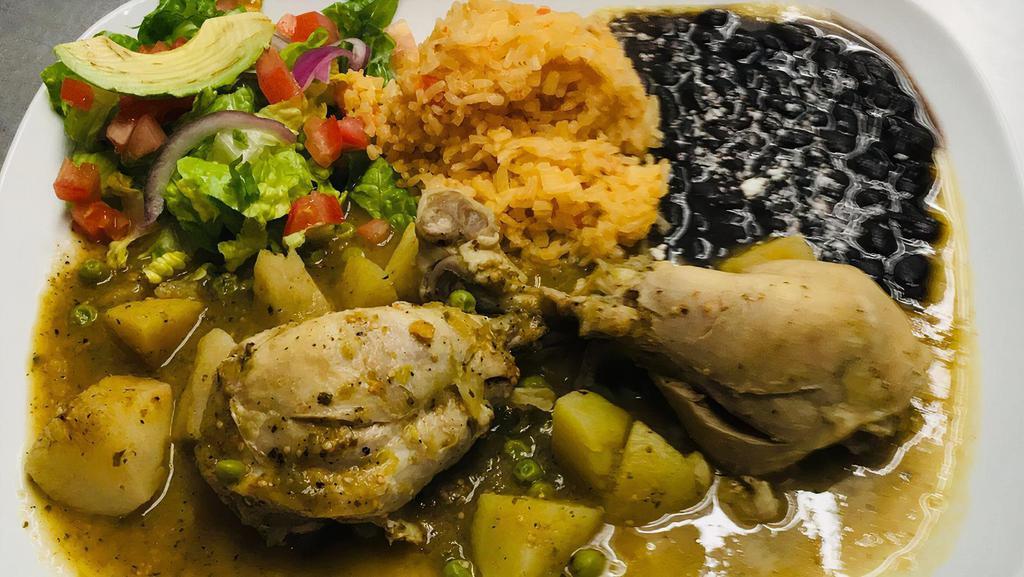 Pollo En Salsa/Chicken On Sauce . · Chicken in green sauce with potatoes and peas, served with rice, beans and tortillas.