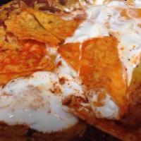 Mexico Potato · 8 oz. potato stuffed with seasoned taco meat. Salsa. Cheese sauce. Sour cream and topped nac...