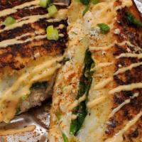 Crab & Spinach Grilled Cheese On Texas Toast · Jumbo Lump Crabmeat on garlic butter Texas toast with garlic cream sauce and ooey gooey prov...