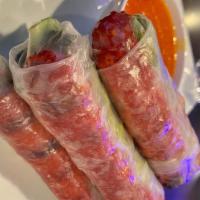 Veggie Summer Rolls · Summer roll wrapped in rice paper , filled with tofu and served with peanut hoisin sauce - 2...