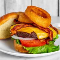 1/2 Lb Western Cheese Burger · Something a little different.  Top your 1/2 Cheese burger with Onion Rings and BBQ Sauce.  C...