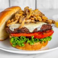 1/2 Lb Piled High Mushroom Burger · 1/2 lb Mushroom Burger piled with grilled mushrooms in our home made garlic parm butter.  Ad...