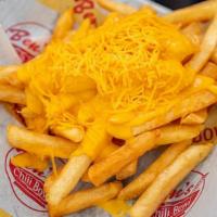 Cheese Fries · A generous portion of golden fries, topped with smooth nacho cheese sauce.