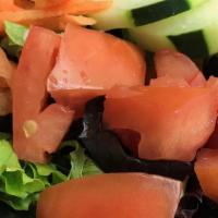 Fresh Garden Salad · Fresh salad greens, cucumber, tomatoes, carrots, and the dressing of your choice.