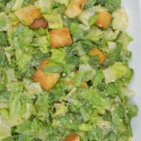 Caesar · Crisp romaine lettuce, croutons, and freshly grated parmesan cheese, topped with a creamy ca...