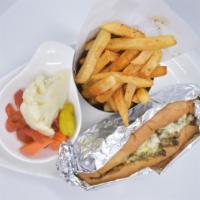 Chicken Filet · Breaded chicken topped with American
cheese, lettuce, tomatoes & mayonnaise