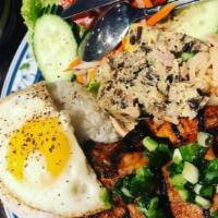 Special Broken Rice Plate · Broken Rice, Sunnyside up Egg, 220g Pork Chop, Shredded Pork Skin, Bake Egg, and a side of s...