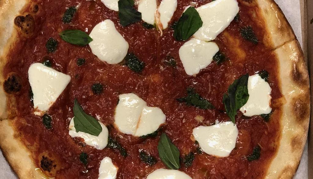 Margherita Pie · house red sauce | fresh mozzarella | basil | evoo | pecorino