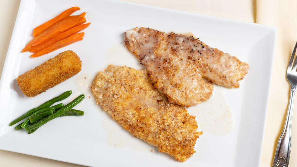 Sole Pignoli · Filet of sole incrusted with pignoli nuts and toasted almonds in a lemon sauce