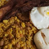 Calentado Granjero · Chicharron, lomo asado, calentado, huevo, y arepa Colombian fried pork, grilled pork loin, b...
