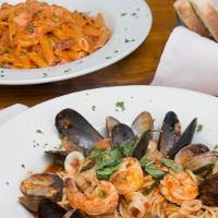 Spaghetti Pescatore · Shrimp, clams, mussels, calamari, tomato broth
