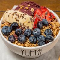 Acai Bowl · Organic Acai, Granola almond honey, Banana, Blueberries, Strawberries, Cocoa nibs, Dried goj...