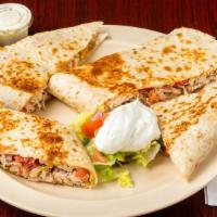Chicken Quesadilla · Made with your meat preference, pico de gallo and cheese. Served with sour cream.