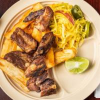Yuca & Chicharrones Daily Special · Marinated pieces of pork deep fried. Served with yuca and lightly cooked cabbage.