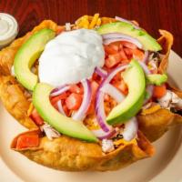  Fish Taco Salad · Flour tortilla shell filled with lettuce, tomatoes, red onion, beans, avocado, cheese, and s...