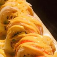 Nina Roll · Spicy crab cucumber, top snow crab masago with spicy mayo and eel sauce.