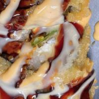 Queen Roll · Deep-fried salmon, cheese snow peas with three kinds topped with yum yum sauce, spicy mayo, ...