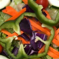 Garden Salad · Romaine lettuce, red cabbage, tomatoes, green peppe,  cucumbers, carrots olives, pepperoncini.
