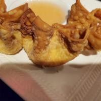 Crab Rangoon (4) · Crab meat, cream cheese and scallions in crispy wrappers.