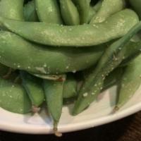 Edamame · Japanese soybeans lightly salted in the pot, served warm.