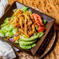 Grilled Chicken & Avocado Salad · A bed of romaine lettuce topped with grilled seasoned chicken breast, avocado slices, tomato...