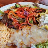 Tampiqueña · Grilled rib-eye steak topped with Grilled bell peppers and onions, with a cheese enchilada.