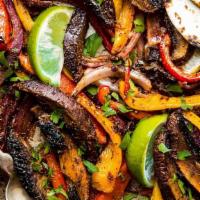 Veggie Fajitas *Eat Fit · Bella mushrooms, caramelized onions, grilled zucchini, yellow squash, bell pepper, and spina...