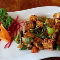 Dry Chili Paneer · Spicy. Cottage cheese cubes with ginger, garlic, green chili, and coriander.