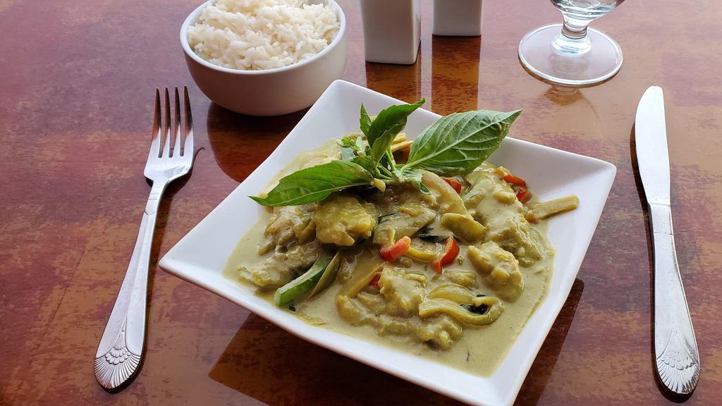 Green Thai Curry  · With bell pepper, bamboo shoots and onion in  coconut milk based curry - Choose protein of your choice Chicken/Lamb/Fish