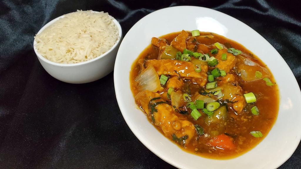 Hakka Chili Fish · Tilapia fish with bell peppers onion and scallions in chili sauce.
