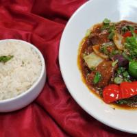 Hakka Chili Lamb · Diced lamb with bell peppers onion and scallions in chili sauce.