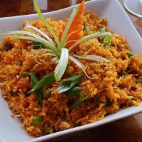 Chef'S Special Fried Rice · Regular fried rice. Basmati rice tossed in soy sauce, carrots, peas, onions & scallion