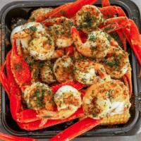 Crab & Shrimp Tray · 2 clusters of snow crab legs, 10 shrimp, 1 sausage, 1 corn, 1 egg, potatoes.