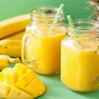 Tropical Smoothie · Fresh tropical blend of orange juice, banana, and pineapple.