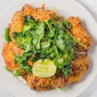 Crispy Wings Thai Garlic Sauce (9) · Hot and spicy. Has a taste of lime and cilantro.