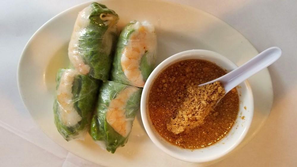Nime Chow (2) · Fresh roll wrapped in a rice wrap with steamed rice noodle, Thai basil, bean sprout, lettuce, and shrimp served with peanut sauce.