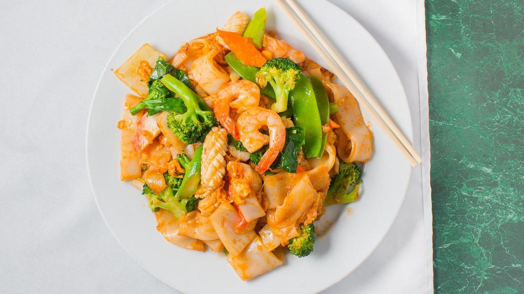 Thai Pad See Ew Noodle · Thai style. Prepared with flat wide rice noodle, Chinese broccoli, onion, peapod, carrot and American broccoli.