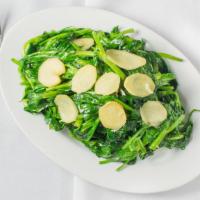 Peapod Leaves Fresh Ginger Garlic Sauce · Peapod leaves stir-fried with ginger and garlic lightly to enhance the natural flavor.