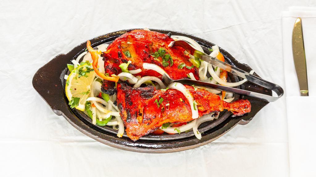 Tandoori Delight · Lamb kabab, chicken tikka, chicken tandoori, seekh kabab, and shrimp kabab. Served with bashmoti rice pilaf.