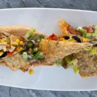 Southwest Chicken Egg Rolls · black beans, roasted corn, peppers, red onion and mozzarella served on a bed of pico de gall...