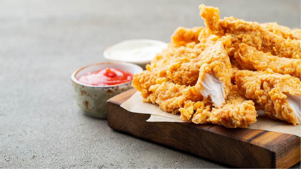 Crispy Chicken Strips · Jumbo All-white-meat Crispy Chicken Strips hand cut and battered to order. Served in your choice of spice level, with a side of golden crispy fries.