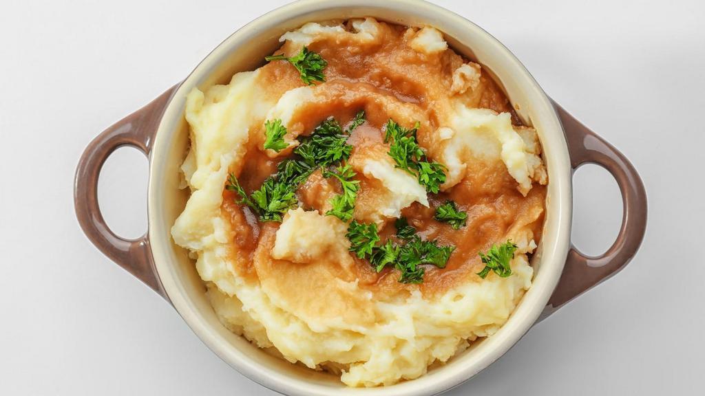 Loaded Mashed Potatoes · Real Mashed potatoes prepared with butter cream, chopped bacon, and cheddar cheese, topped with old fashioned skillet gravy.