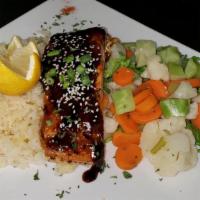 Grilled Salmon · Choice of Lemon Pepper, Cajun, or Teriyaki. Served with rice mixed & vegetables.