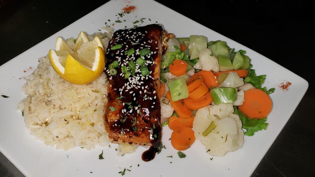 Grilled Salmon · Choice of Lemon Pepper, Cajun, or Teriyaki. Served with rice mixed & vegetables.