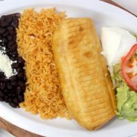 Chicken Chimichanga · Green salsa, cheese, and peppers. Served with rice, beans, guacamole, and sour cream.