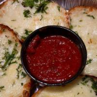 Garlic Cheese Bread · Our garlic bread with jack and mozzarella cheese, baked and sprinkled with Romano.