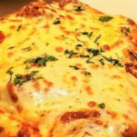 Veal Parmigiana · Breaded veal, smothered in our meat sauce, then topped with mozzarella cheese and baked.